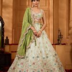 Embroidered Sequinned Semi-Stitched Tissue Lehenga & Blouse With Dupatta